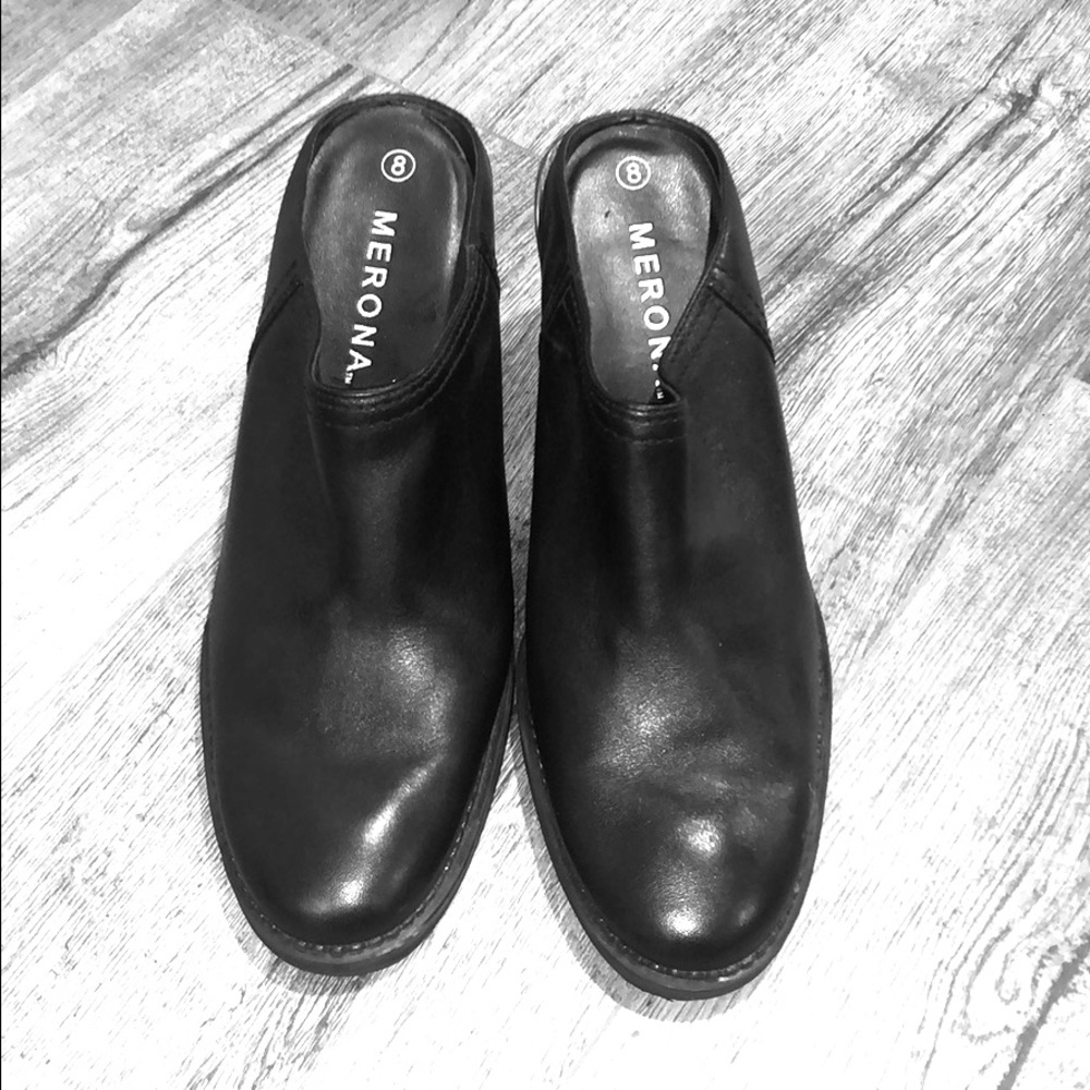 Black leather slip on heals.